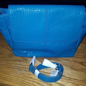 Authentic 31 Fashion week teal affair retired